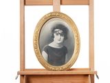 a picture of a woman in a black dress in a picture frame