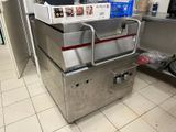 an image of a commercial kitchen with a lot of items