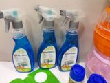 several bottles of cleaning products on a table