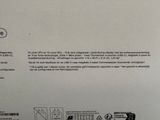 the back of a box with a picture of a cell phone in it