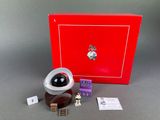 a red box with a clock and some keys on it