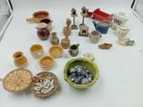 many different types of pottery on the table