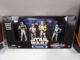 star wars action figures are displayed in a display case
