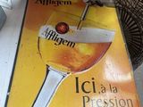 a sign that says it is a glass of beer