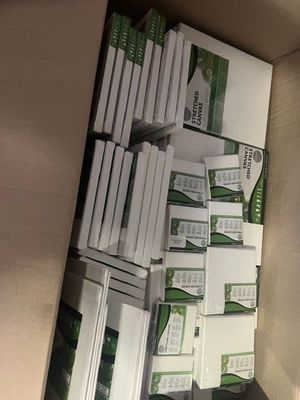 boxes of cigarettes are stacked on top of each other on a shelf