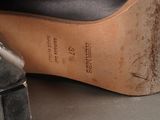 a close up of a pair of shoes on a table