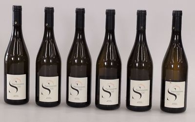six bottles of wine are lined up in a row