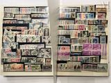 a book with stamps on the pages and a book with stamps on the pages