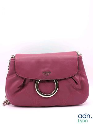 a close up of a pink purse on a white background
