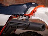 a close up of a motorcycle with a seat on it ' s back