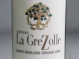 a bottle of wine with a tree on the label
