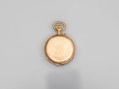 an 18k gold pocket watch with a gold case and a gold chain