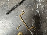 a metal object that is laying on the floor
