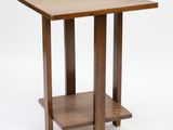 an image of a small wooden table with a shelf underneath it