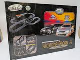 a box with a model of a race car and a model of a race car