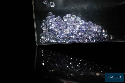 a clear bag filled with blue and white beads