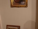 a picture of a picture of a vase of flowers on the wall