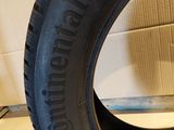 a close up of a tire on a cardboard box
