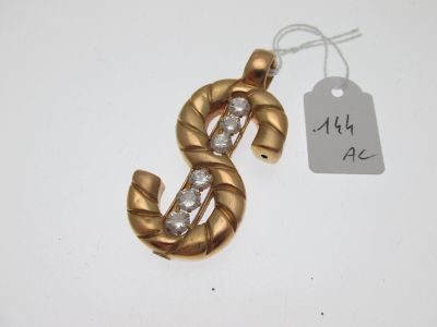une image représentant un signe « $ » doré orné de diamants