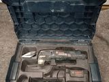 a tool in a case that is open on the floor