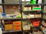 many boxes and boxes on the shelves in the room