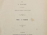an old book with a black and white image of the title of the book