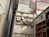 a machine that is sitting inside of a building