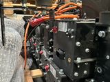 a machine that is sitting on a pallet in a warehouse