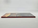 a book on a white surface with a white background
