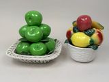a small bowl of fruit next to a small bowl of fruit