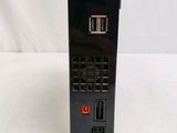 a black cell phone with a red button on it