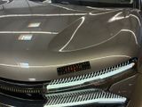 a close up of a car in a showroom