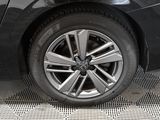 a close up of a car ' s wheel on the ground
