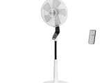 an image of a fan and remote control on a stand