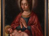 une peinture à l'huile représentant une femme tenant un bébé sur ses genoux
