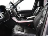 the interior of a car with black leather seats and a steering wheel