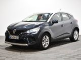 Une Renault C-Cross grise est garée sur un sol à damier
