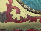 a picture of a close up of a painting on a wall