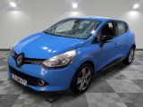 a blue car is parked in a room with a checkered floor