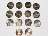 a lot of coins arranged in a circle on a table