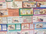 a lot of different types of tickets on the wall
