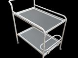 a white metal trolley with two shelves on it