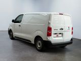 a picture of a white van parked in a room