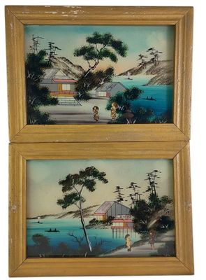 deux tableaux encadrés représentant des paysages asiatiques : un lac et des montagnes