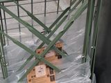 a cart that has a bunch of boxes in it