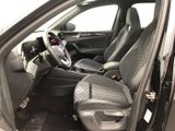 the interior of a car with the door open and the driver ' s seat up