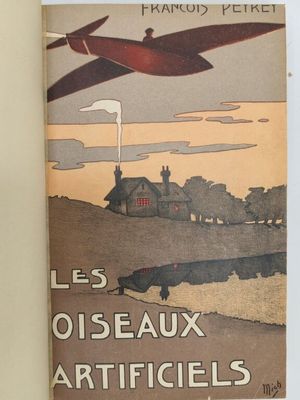 un livre sur lequel figure l'image d'un avion survolant un champ