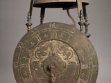 a clock that is sitting on top of a table