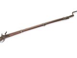 a rifle with a wooden barrel and a metal handle