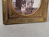 a picture of a picture of a family in a picture frame